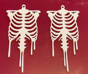 Rib cage earrings with Drip