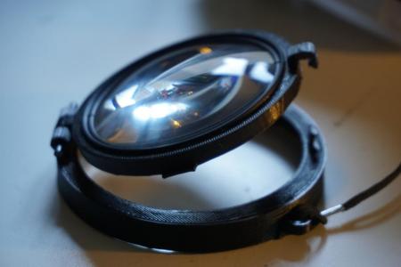 Flip lens holder for Meikon underwater camera housing