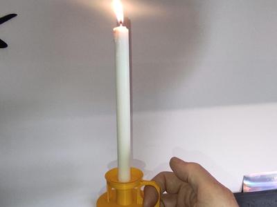 Simple candlestick and decorative candle