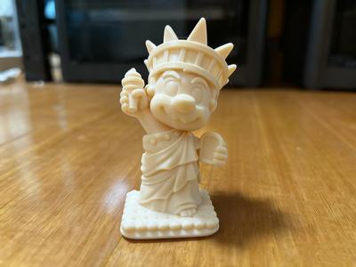 Funny Free Mario figurine holding an ice cream cone