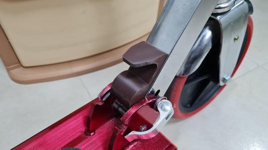 Kick Scooter Fold Release Tab
