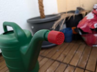 Watering can attachment no drip/spill top
