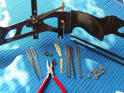 Carbon fiber clicker for archery bow