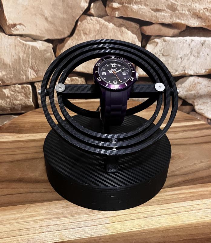 Gyroscopic winding mechanism for automatic watches