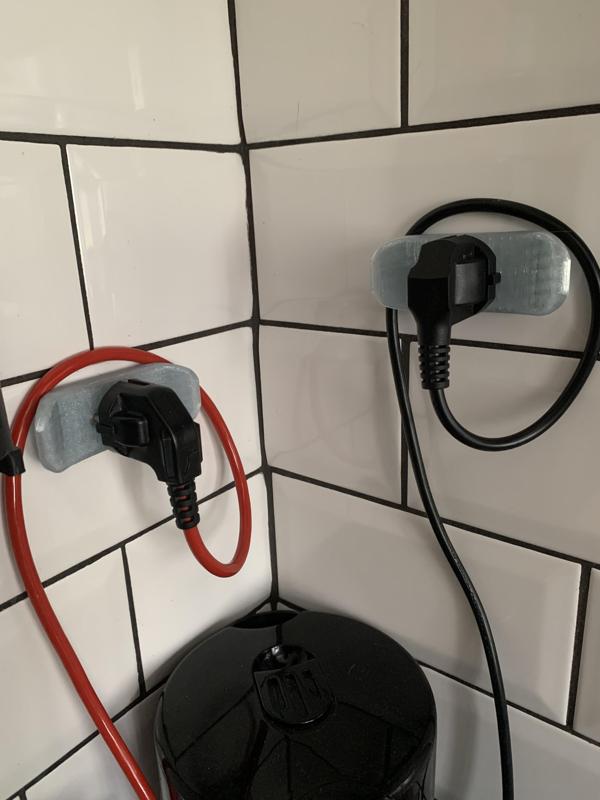 Držák kabelu a zástrčky