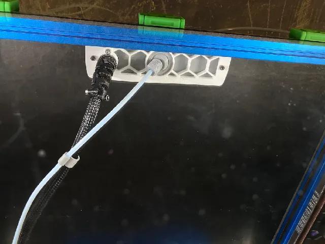 PUG and pivoting bowden exhaust grill