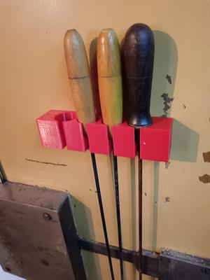 Gun cleaning rod holder