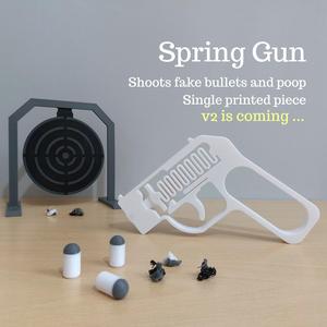 Spring Gun - Shoots fake bullets and poop