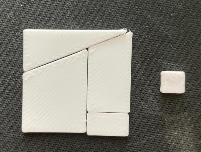Rearranging tile optical puzzle