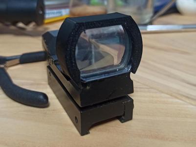 Red dot enclosure
