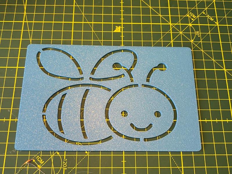 Montessori coloring page depicting a bee