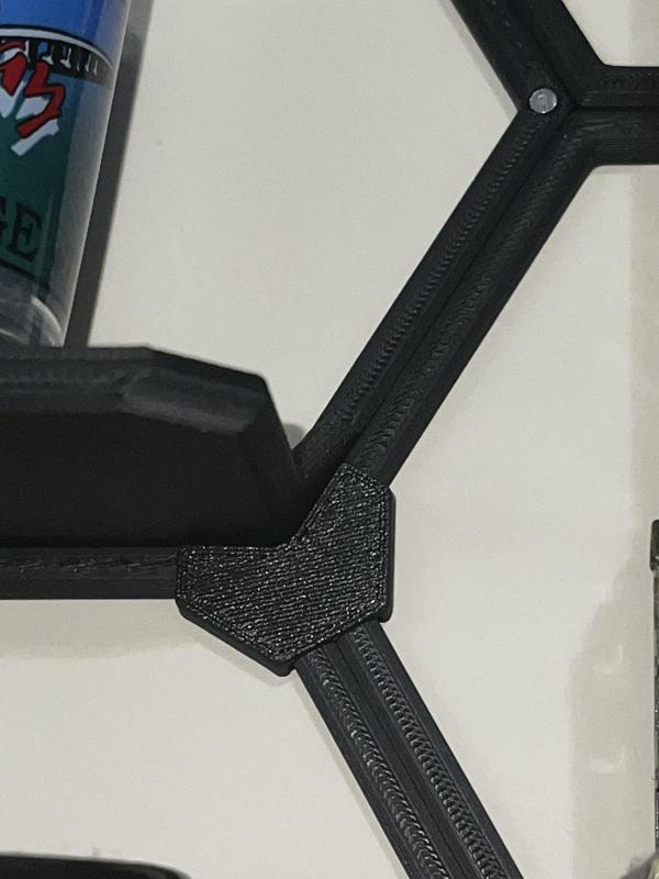 Connector for Shelved Sections of Wall Display Shelf