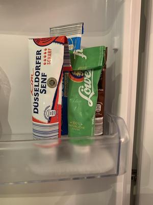 Paste tube rack for fridge door