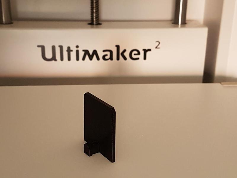 Adhesive hook for clock (no drilling)