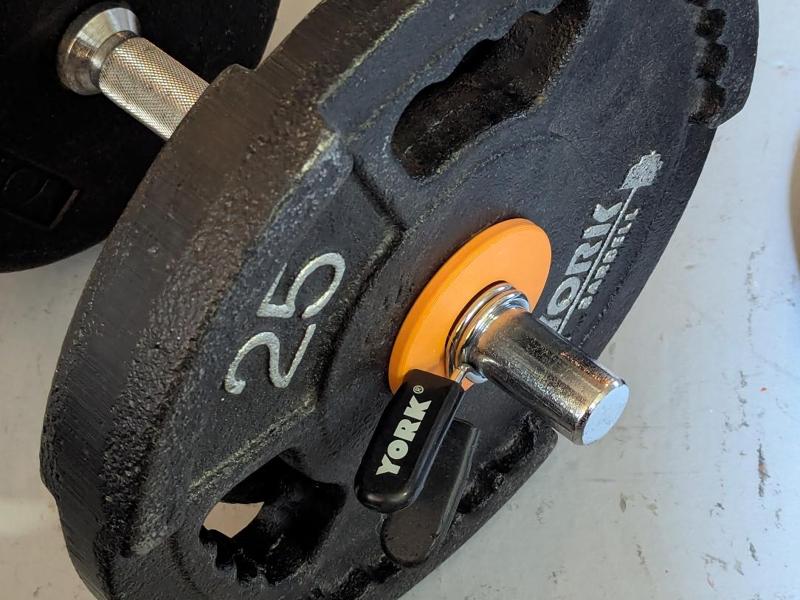 Weightlifting plate diameter adapter 2in to 1in