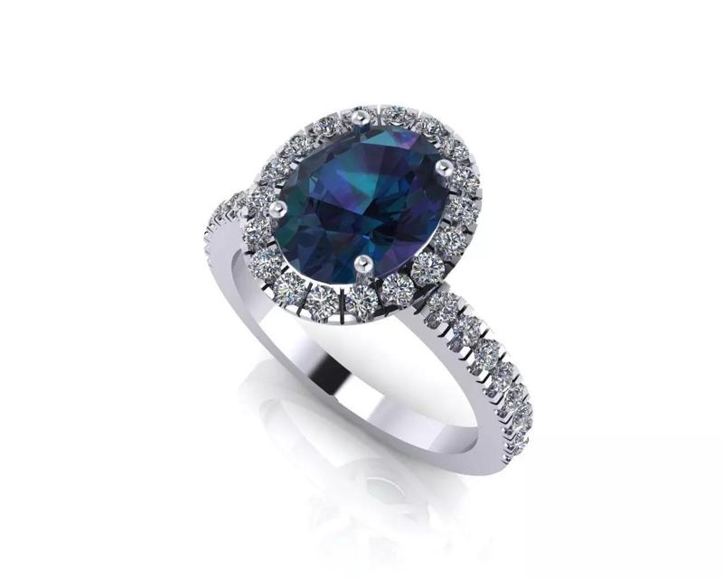 Oval ring with Halo and Shoulder Diamonds