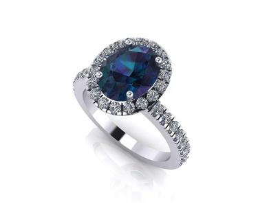 Oval ring with Halo and Shoulder Diamonds