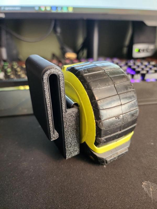 Tape measure belt clip