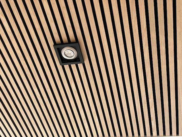 Spot base for acoustic panels