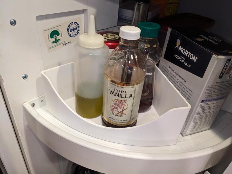 wedge shaped bin for turnstile cabinet