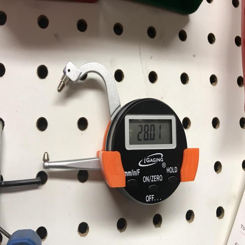 Pegboard holder for digital thickness gauge