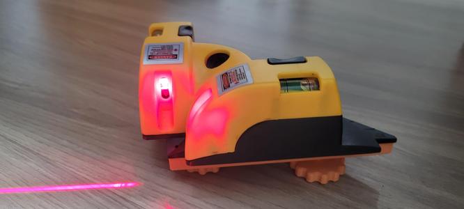 Right angle laser square leveling base
