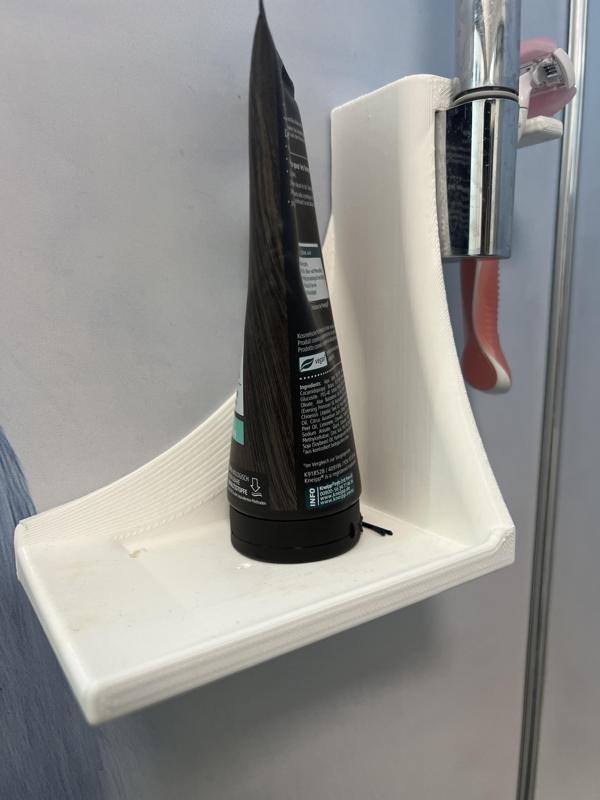 Shower tray with shaver holder