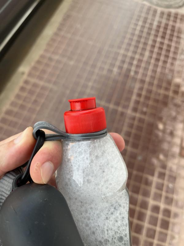 Dishwasher bottle holder for dog pee