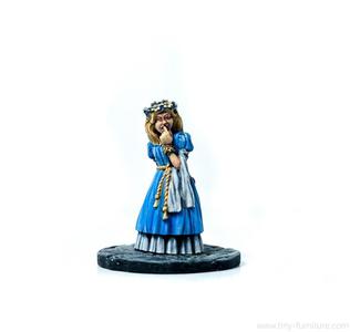 Curious girl in a flower wreath