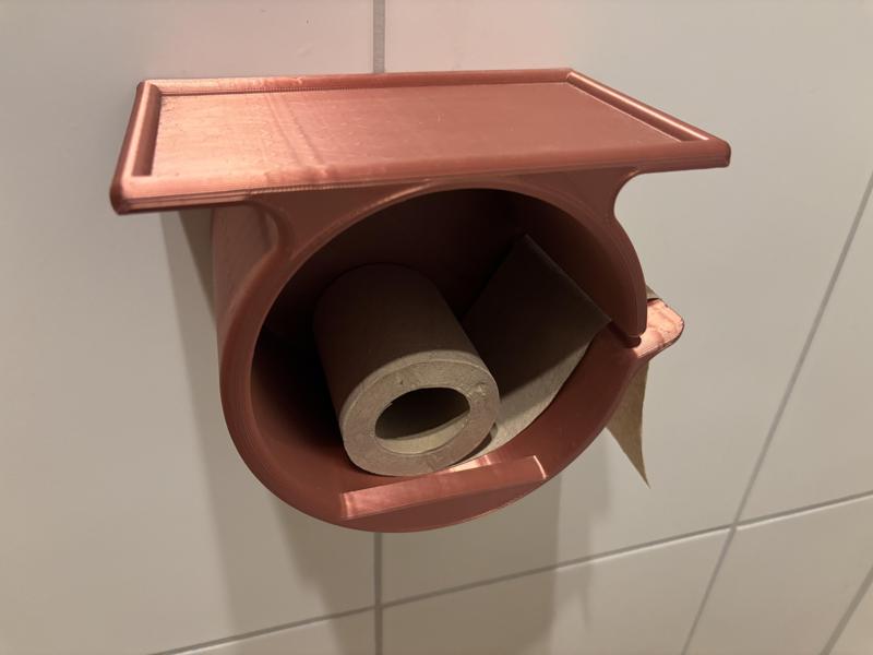 Toilet paper holder with tray