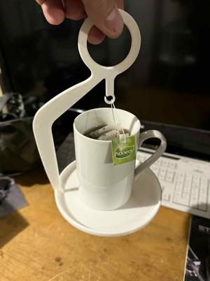 Mug holder, tea bag holder
