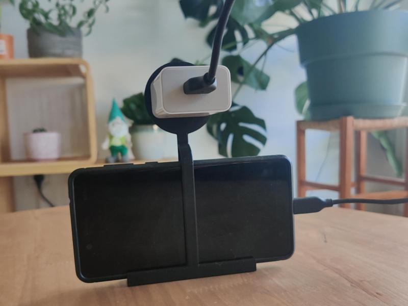 Wall phone hanger