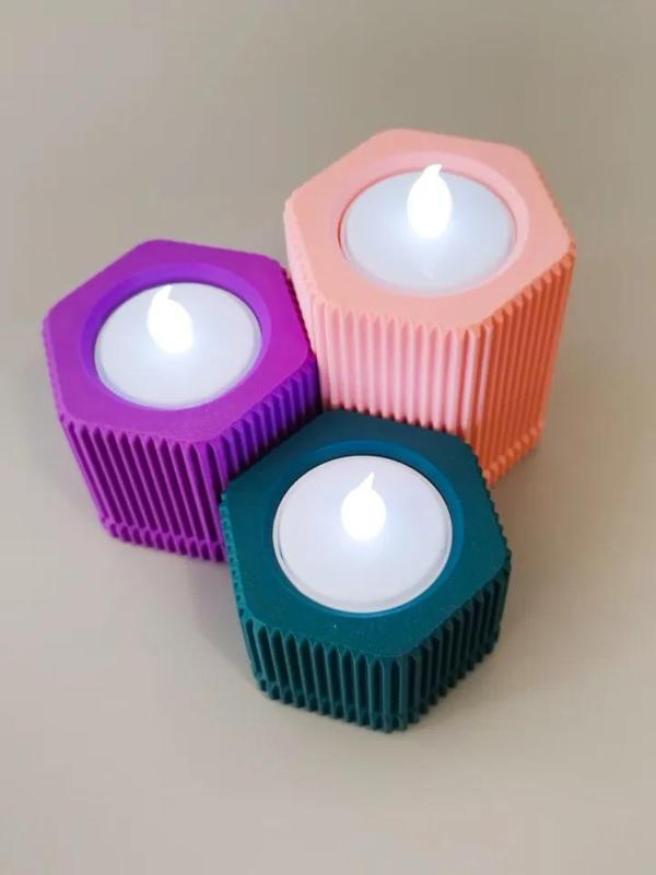 Hexagon candle holder with grooved texture.   
