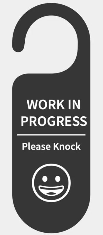 Work in progress please knock door sign   