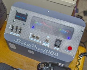 Console for copying color sides in a Carousel tray