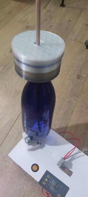 Container with a through-hole