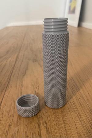 Screw top cylinder with knurled surface
