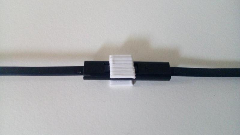 Earphones Button Holder