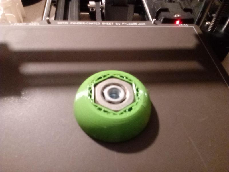 Stand/paperweight with built-in nut M16