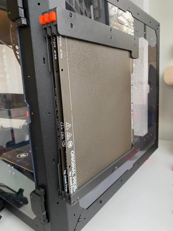Expandable Steel Sheet Holder for Prusa Enclosure with Seesaw Eject Button Mechanism