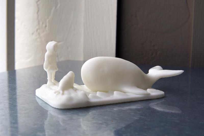 Eskimo with whale and seal