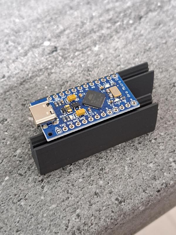 Pin header holder for soldering