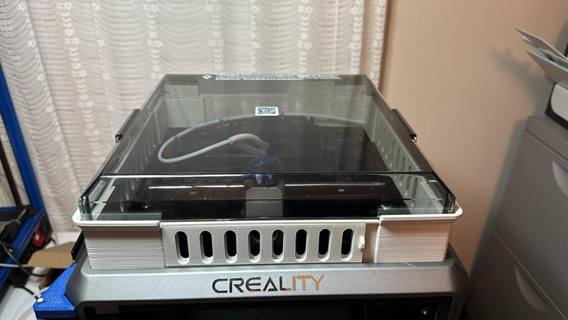 Remix K1 riser with hinges for lid, added vents (open/close), PTFE tube exit out right rear to the side.