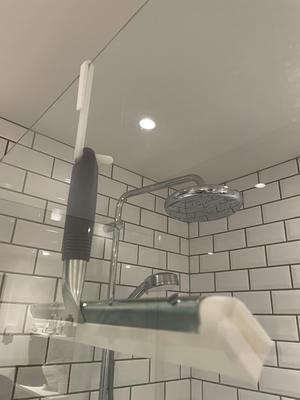 Shower wiper or sponge hanger for glass/plastic open-top showers (parametric)