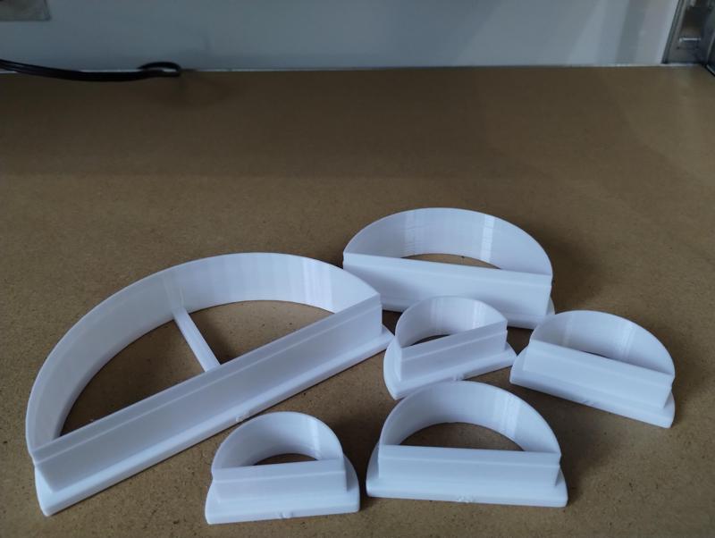 HALF-MOON RESIN, JEWELRY, AND COOKING CUTTER, VARIOUS SIZES