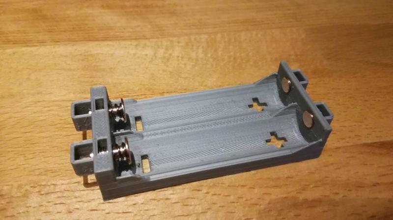 spring-loaded battery holder for 18650 batteries