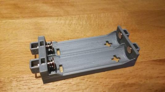 spring-loaded battery holder for 18650 batteries