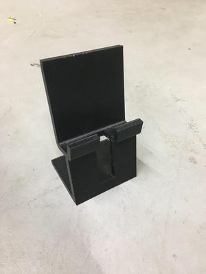 Phone stand with charger slot