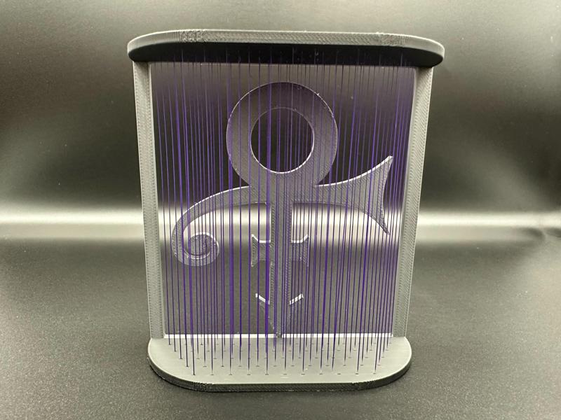 Prince Love Symbol Under Purple Rain