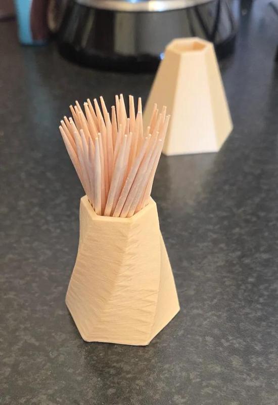 Toothpick holder, with a twist   